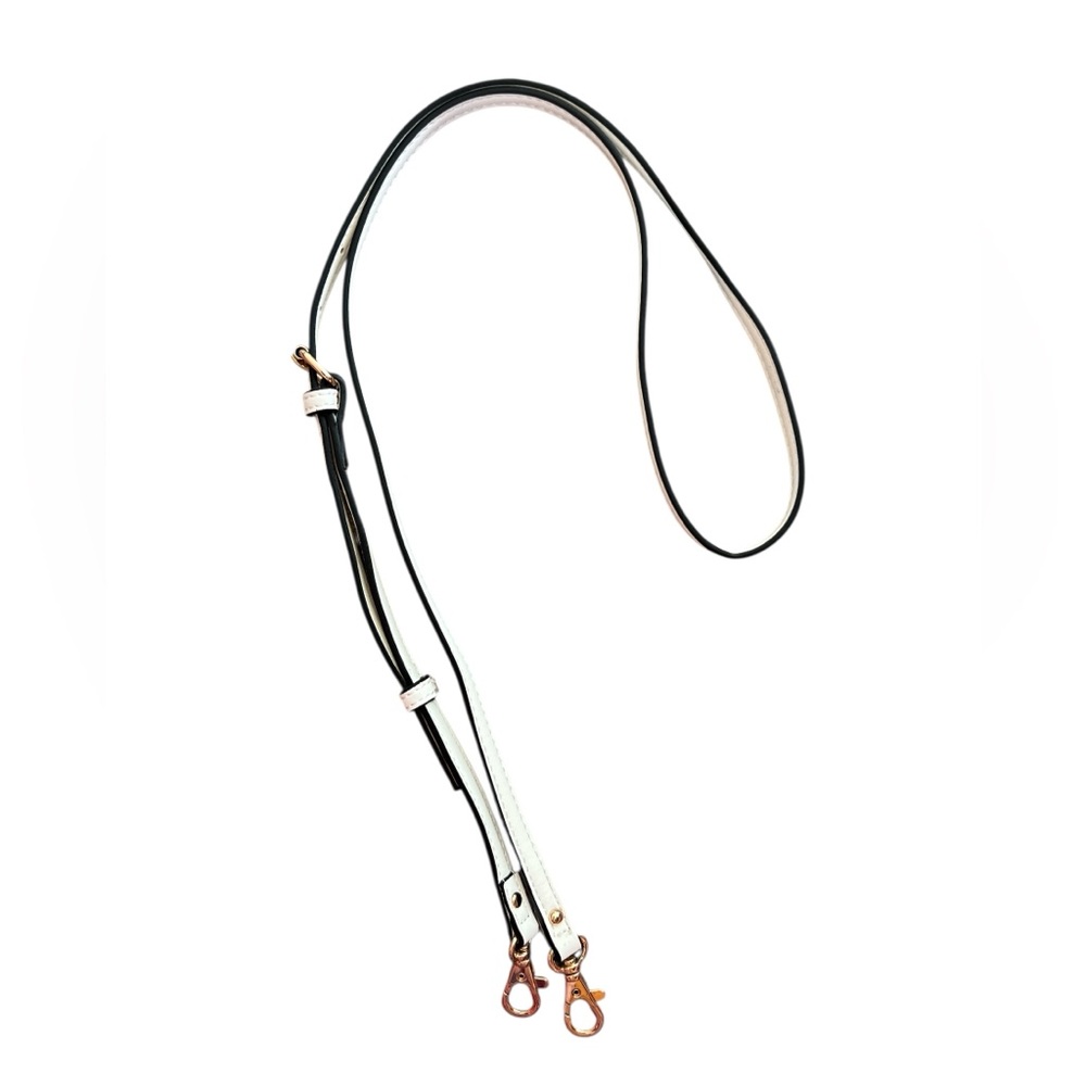 White crossbody strap with gold hardware